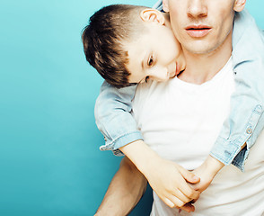 Image showing young pretty man model with little cute son playing together, lifestyle modern people concept, family male 