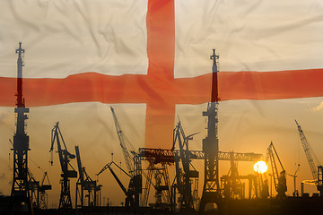 Image showing Industrial concept with England flag at sunset