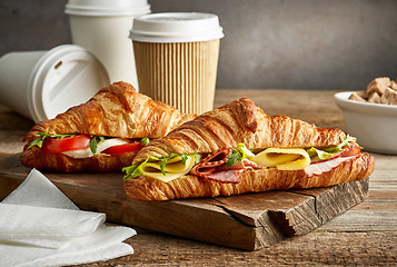 Image showing croissant sandwiches and coffee cups