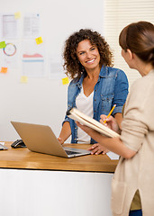 Image showing Two businesswoman working together