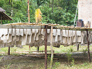 Image showing Raw rubber sheets drying in Myamar