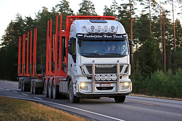 Image showing White Iveco Stralis Logging Truck in Evening Light