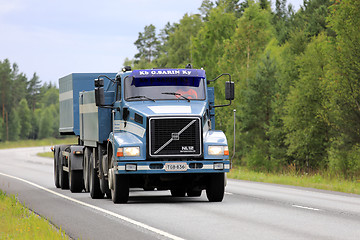 Image showing Blue Volvo NL12 Gravel Transport Truck on Road