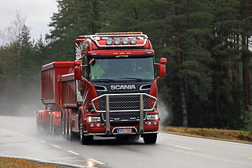 Image showing Red Scania Trucking on Wet Road