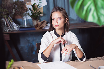 Image showing Portrait of a businesswoman who is working at office