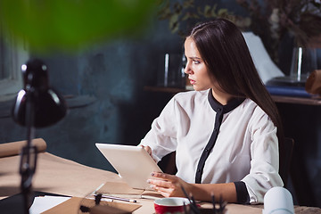 Image showing Portrait of a businesswoman who is working at office