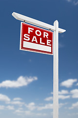 Image showing Left Facing For Sale Real Estate Sign on a Blue Sky with Clouds.