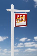 Image showing Right Facing Sold For Sale Real Estate Sign on a Blue Sky with C