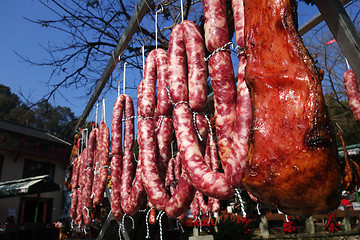 Image showing The meat drying outside on the sun