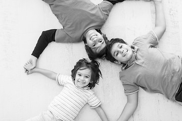 Image showing young boys having fun on the floor