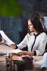 Image showing Portrait of a businesswoman who is working at office