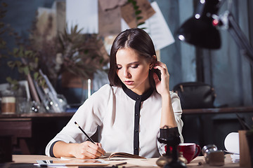 Image showing Portrait of a businesswoman who is working at office