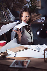 Image showing Young business woman throwing documents at camera.