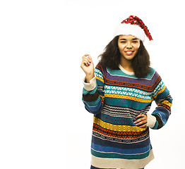 Image showing cute young real african hipster girl in santas red hat isolated 