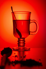 Image showing Concept still life tea in a glass