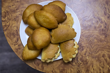 Image showing Pile of tasty baking for tea on a plate