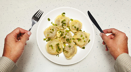 Image showing Meat dumplings in front of visitor