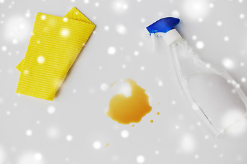 Image showing cleaning rag, detergent spray and spilled stain