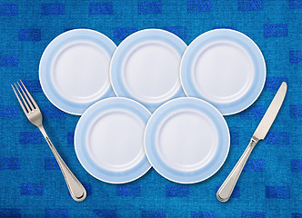 Image showing Five white plates 