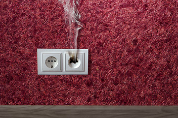 Image showing burned standard electrical outlet