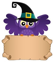 Image showing Halloween owl holding small parchment