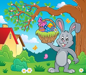 Image showing Bunny holding Easter basket topic 2