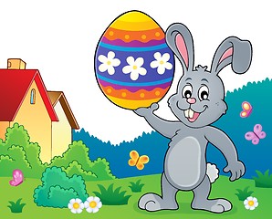 Image showing Bunny holding big Easter egg topic 2