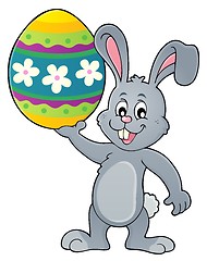 Image showing Bunny holding big Easter egg topic 1