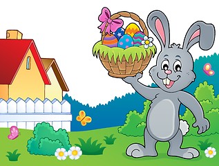 Image showing Bunny holding Easter basket topic 4