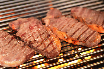 Image showing Beef steaks on the grill