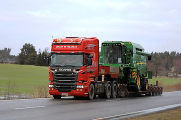 Image showing Scania Truck Hauls Combine as Wide Load