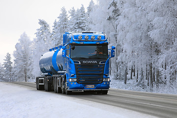 Image showing Blue Scania Tank Truck on Winter Road