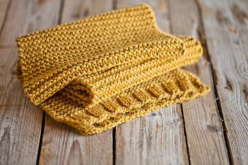 Image showing knitted yellow scarf