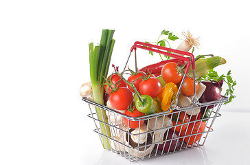 Image showing Raw vegetables in basket isolated 