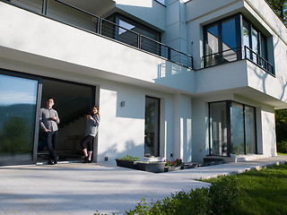 Image showing couple enjoying on the door of their luxury home villa