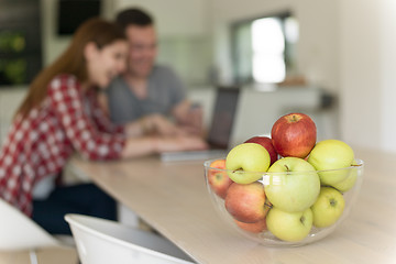 Image showing happy young couple buying online