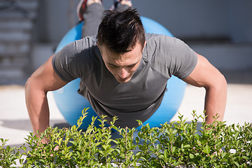 Image showing man doing morning yoga exercises