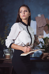 Image showing Portrait of a businesswoman who is working at office