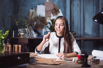 Image showing Portrait of a businesswoman who is working at office