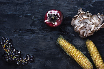 Image showing Organic vegetables on wooden table. Top view