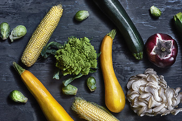 Image showing Organic vegetables on wooden table. Top view