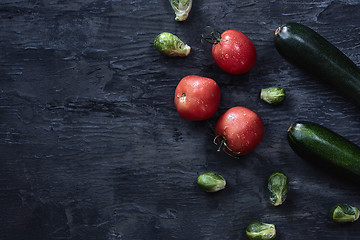 Image showing Organic vegetables on wooden table. Top view