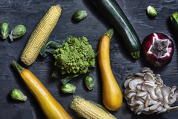 Image showing Organic vegetables on wooden table. Top view