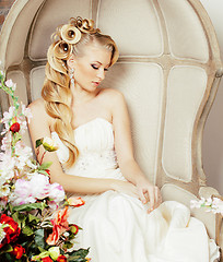 Image showing beauty young bride alone in luxury vintage interior with a lot o