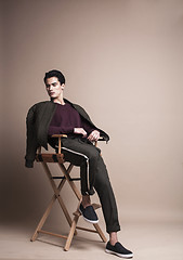 Image showing handsome fashion looking man posing in studio, lifestyle modern people concept