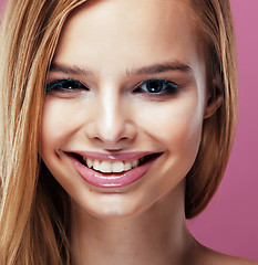 Image showing young pretty blonde woman with hairstyle close up and makeup on 