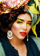 Image showing beauty bright woman with creative make up, many shawls on head l