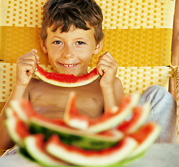 Image showing cute young little boy with watermelon crustes smiling