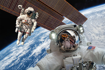 Image showing International Space Station and astronaut.