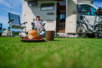 Image showing Coffee Mug on grass. Family vacation travel, holiday trip in mot